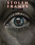 A close-up of a human eye with a blue iris and a circular symbol in the pupil, overlaid with the text 'STOLEN FRAMES' and 'SEED-015C STATUS: SEALED'. The face surrounding the eye is heavily textured and dark gray, with a faint circular emblem visible on the cheek.
